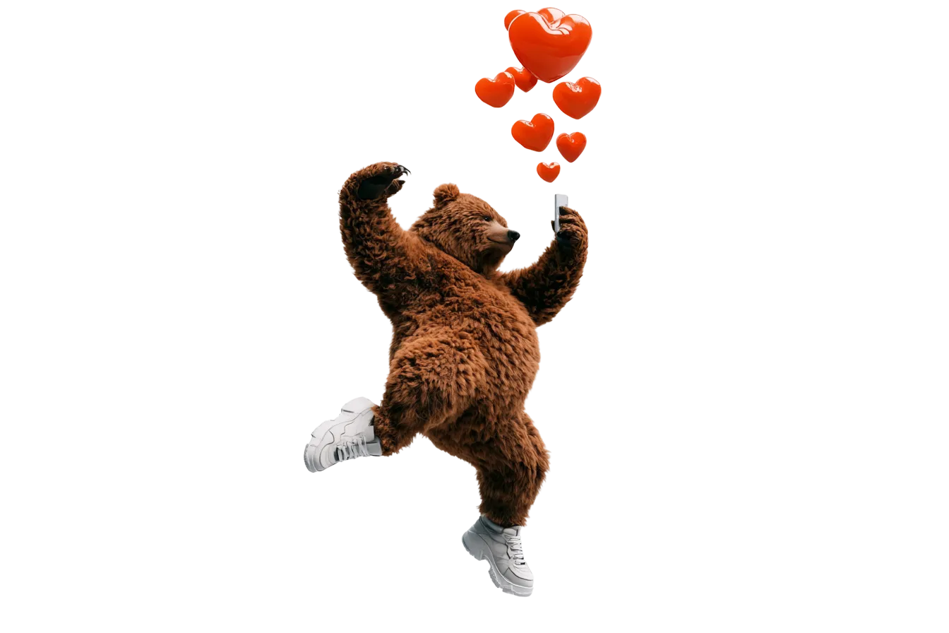 A brown bear in chunky sneakers dancing mid-air.